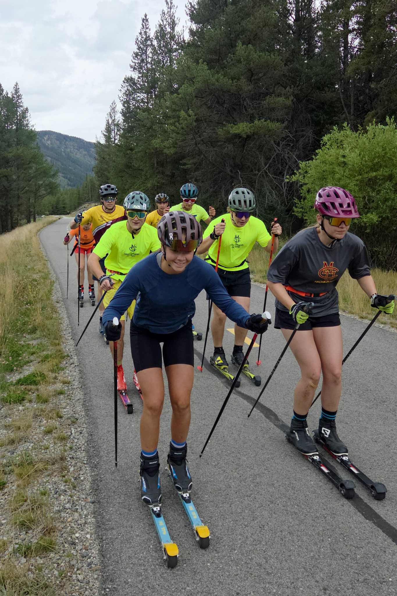 CMU athletes training together on rollerskis