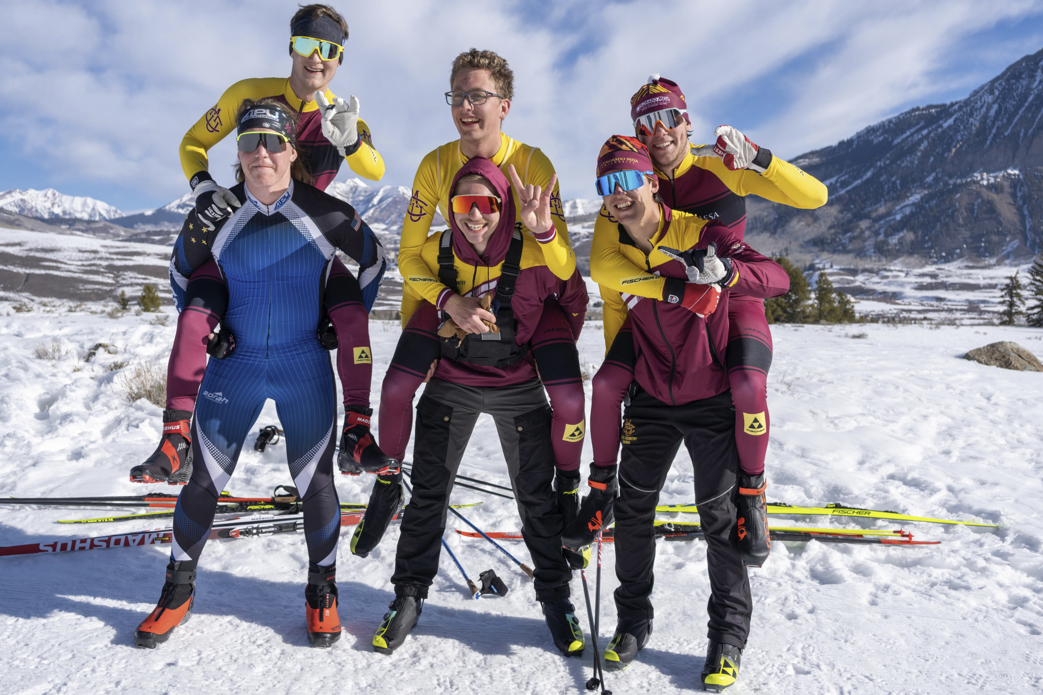 CMU Cross Country Ski Team members together at a race